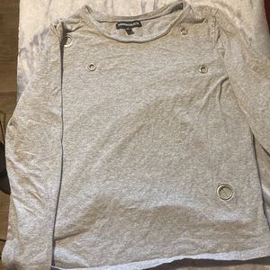 Long sleeve shirt with metal holes